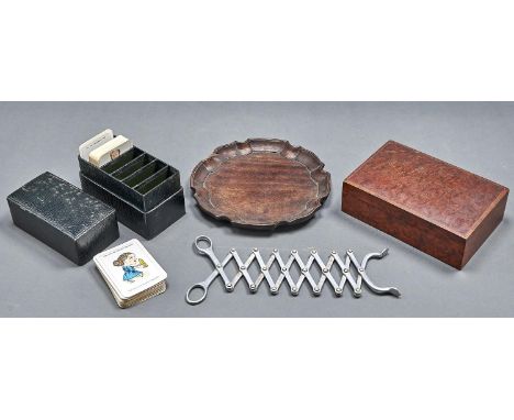 A mahogany waiter, a pair of aluminium lazy tongs, an amboyna cigarette box and a Victorian straight grained green morocco pl