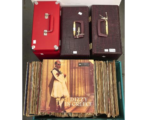 An extensive collection of vintage vinyl LP records in three cases and a box  
