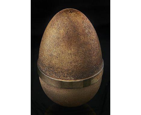 Stuart Devlin. An Elizabeth II silver gilt egg, the plant surprise with imitation pearl flowers, 73mm h, maker's mark, London