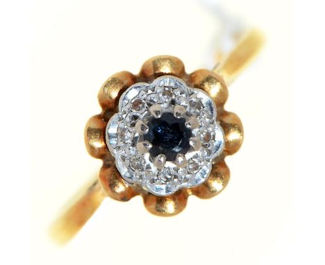 A sapphire and diamond cluster ring, in 18ct gold, 3.2g, size M  enquiries@retfordlifemagazine.com