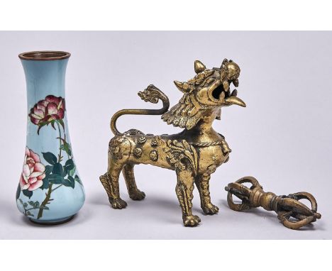 A South East Asian cast bronze sculpture of a mythical beast, 16cm h and a bronze varja (2)  Both complete