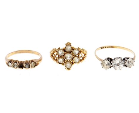 A paste ring, in gold marked 18ct &amp; SIL and two other gem set gold coloured metal rings, 5g, various sizes  Typical wear 