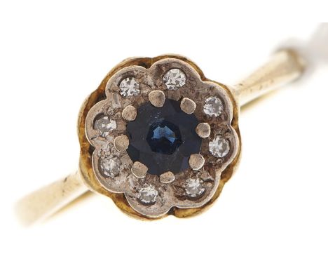 A sapphire and diamond cluster ring, in 18ct gold, London 1968, 3g, size L  Good condition