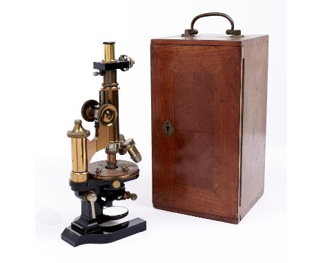 A brass compound microscope, E Leitz Wetzlar, No 69899, for C Baker 244 High Holborn London, early 20th c, focusing by rack w