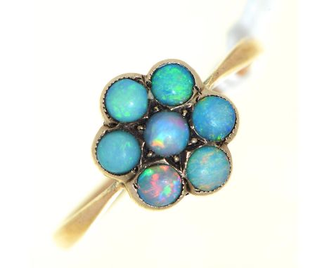 An opal cluster ring, c1900, in gold, 1.4g, size N  Opal lost polish from wear, hoop with wear consistent with age