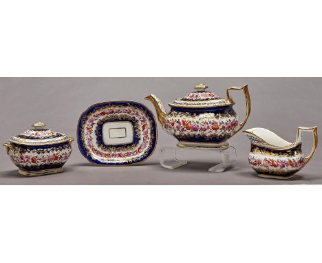 A Coalport cobalt ground tea service, c1815, comprising teapot, cover and stand, cream jug, sucrier and cover,,  painted with