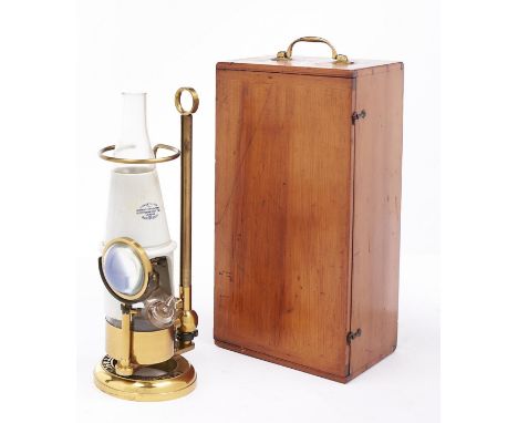 A brass microscope oil lamp, J Swift &amp; Son, London WC, late 19th c,&nbsp; with glass fount and stopper, brass burner, whi