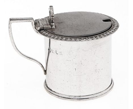 A George V silver drum mustard pot with pierced thumbpiece, blue glass liner, 67mm h, by the Goldsmiths &amp; Silversmiths Co