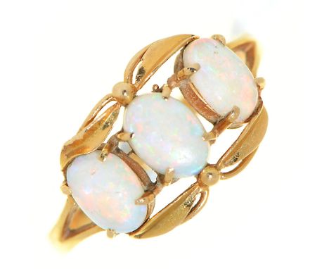 A three stone opal ring, in gold marked K18, 1.6g, size L  Good condition