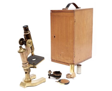 A brass compound microscope, E Leitz Wetzlar, No 61020, c1900, the limb on compass joint to round pillar with screw adjustmen