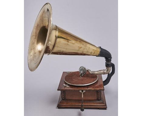 An oak table gramophone, c1920, with black painted iron bracket, nickel plated arm, reproducer and brass horn, the sides of t