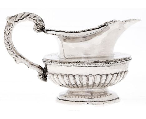 An Irish William IV silver cream jug, partly reeded with cable girdle and acanthus handle, 10cm h, maker's mark indistinct, p