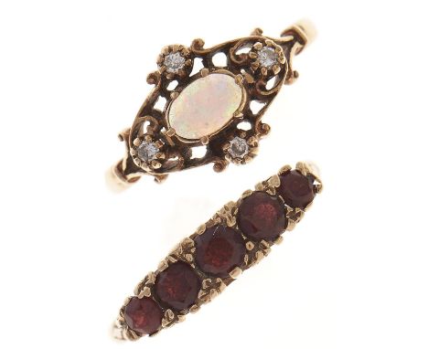 An opal and diamond ring and a garnet ring, both in 9ct gold, 5.2g, sizes L½ and Q½  Light wear