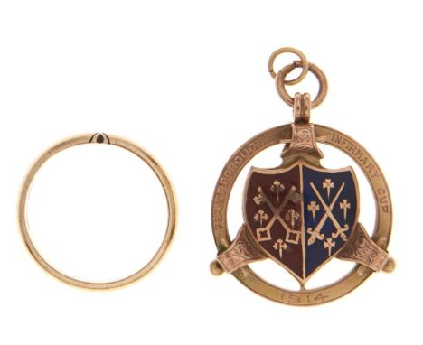 A gold and enamel prize fob medal, inscribed Peterborough Infirmary Cup 1914, marked 9ct and a 9ct gold ring, 14g  Enamel sli