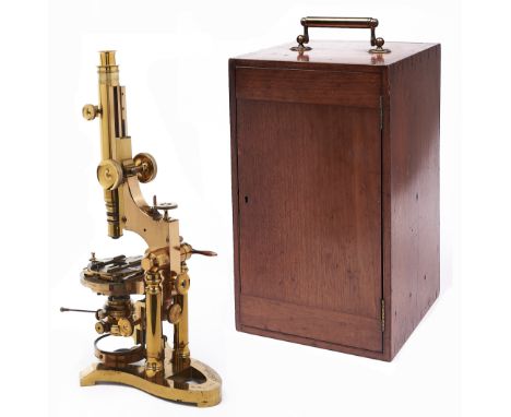 A brass compound microscope, Ross London, No 5389, c1885, the limb on trunnions supported by twin columns, the tilt mechanism