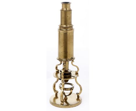 A brass Culpepper type tripod microscope, first half 19th c, the body tube on three S-shaped supports to spring stage, eyepie