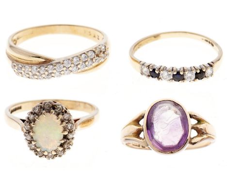 Four 9ct gold rings, variously gem set, 9g, various sizes  Light wear