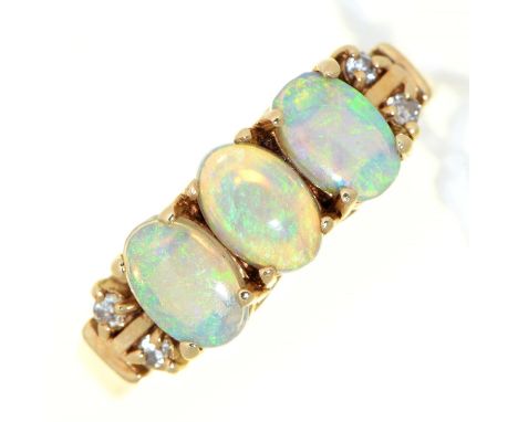 An opal and diamond ring, in gold marked 14k, 2.8g, size L  Opals with only one or two very slight scratches, good polish