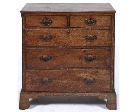 A George III oak chest of drawers, on bracket feet, 91cm l  Shrinkage crack to top, handles replaced