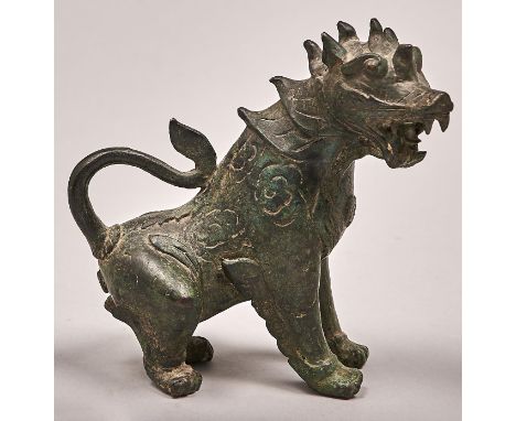 A Chinese bronze sculpture of a mythical beast, greenish dark patina, 14cm h  Casting flaws