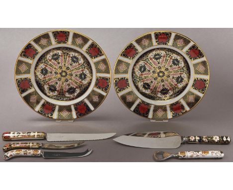 A pair of Royal Crown Derby Imari pattern plates and&nbsp;five Royal Crown Derby porcelain hafted cheese and other knives and