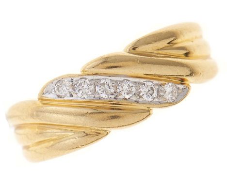 A diamond wrythen fluted 18ct gold band, import marked London 1989, 3.4G, size K½  Good condition