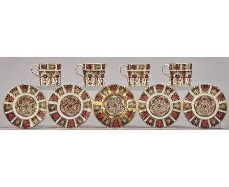 A set of four&nbsp; Royal Crown Derby Imari pattern coffee cans and five saucers, 1977 and c,&nbsp;saucer 11.5cm diam, printe