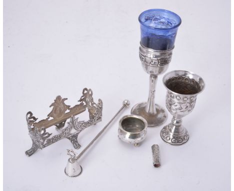 A small collection of silver and silver coloured items, comprising: an embossed goblet, unmarked, 12.5cm (5in) high; an Israe