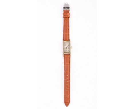 Dunhill, Bi-colour wrist watch   Movement: Warick Watch Co. manual wind, 15 jewels, 3 adjustments Case: Gold plated case, sta