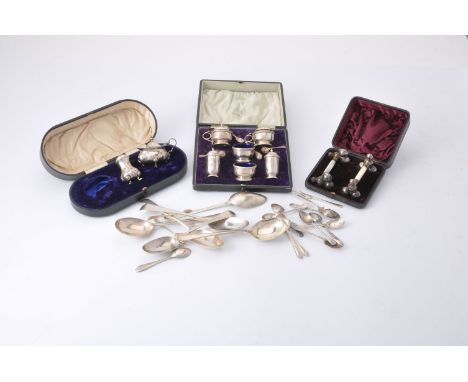 A collection of silver, including: a six piece cruet set by Walker &amp; Hall, Birmingham 1926, in a leather covered case wit