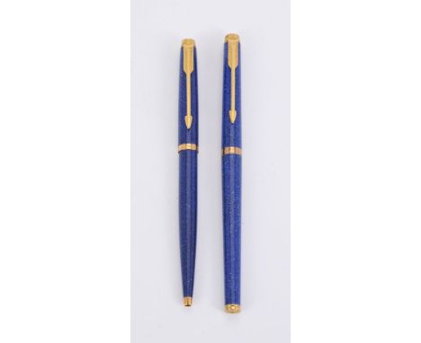 Parker, a blue marbled ball point pen and roller ball pen, with gilt arrow clips, with a Parker box and instruction leaflet