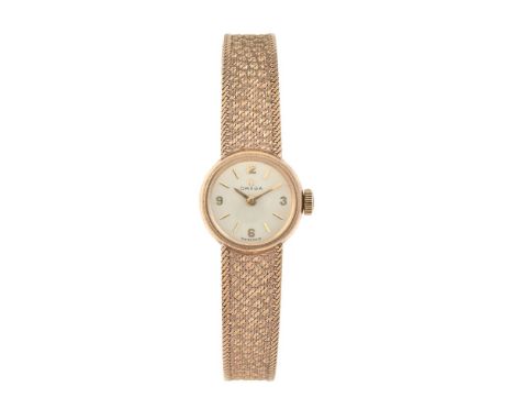 Omega, Lady's 9 carat gold bracelet watch, no. 7115675, circa 1973   Movement: Cal. 484, manual wind, 17 jewels   Case: 9 car