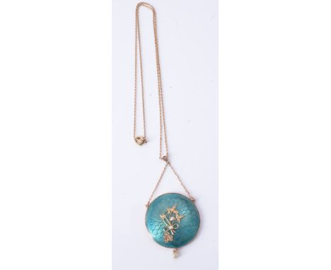 An Edwardian pendant/locket, the circular green guilloché enamel plaque applied with a half pearl set foliate motif, suspendi