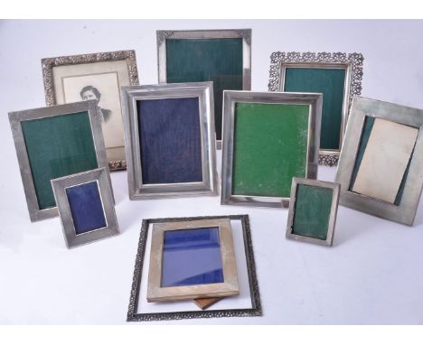 Twelve silver or silver coloured rectangular or shaped rectangular photograph frames, mainly Italian, various dates 20th cent