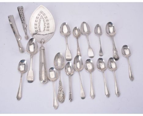 A small collection of silver flatware, including: a George III fish slice, maker's mark worn, London 1786, with a knife type 