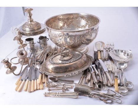 A collection of electro-plated items, to include: a pedestal punch bowl, chased with C-scrolls and flowers, on a circular mou