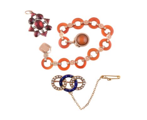 A cornelian bracelet, the openwork circular cornelian links with disc plaque connecting links, on a cabochon cornelian plaque