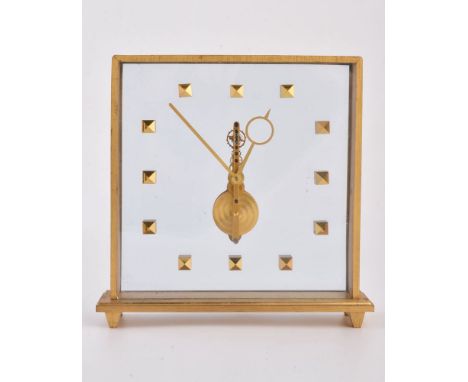 An unsigned brushed brass skeleton clock, with floating movement, pointed baton minute and Breguet hour hands, on bracket fee