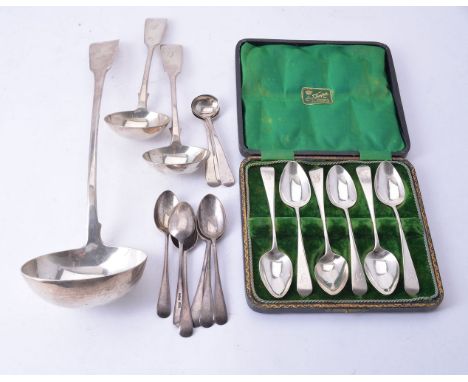 A small collection of silver ladles and spoons, comprising: a George III fiddle pattern soup ladle by Richard Crossley &amp; 