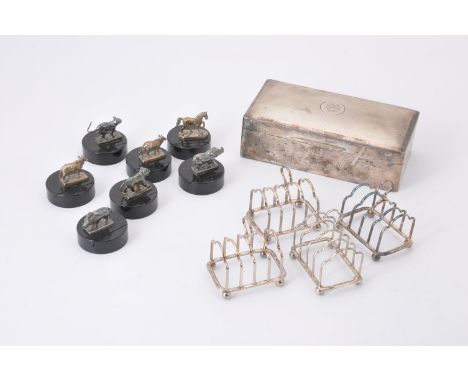 A set of four silver four division toast racks by Atkin Bros, Sheffield 19265, 7cm (2 3/4in) long, 153g (4.9 oz); a rectangul