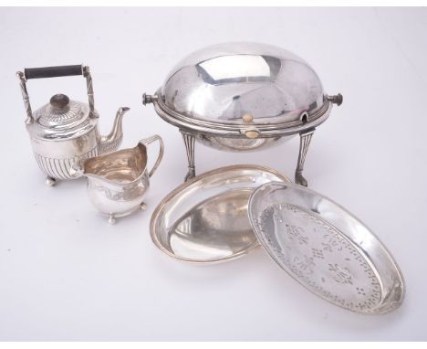 A Victorian silver small tea pot by Horace Woodward &amp; Co., London 1886, with a wooden baton handle over the lobed domed c