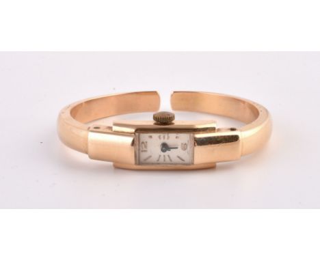 Unsigned,   Lady's gold coloured bangle watch   Movement: Swiss manual wind, 17 jewels   Case: Gold coloured case, snap case 