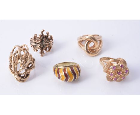 A woven cluster ruby ring, set with seven circular shape rubies stamped 14k, finger size N 1/2, 9g gross; a bombé ring with r