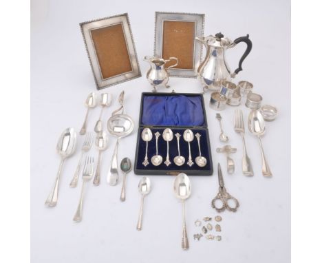 A collection of silver, including: a pair of rectangular photograph frames by Asprey &amp; Co. Ltd, London 1920, 18.5cm (7 1/