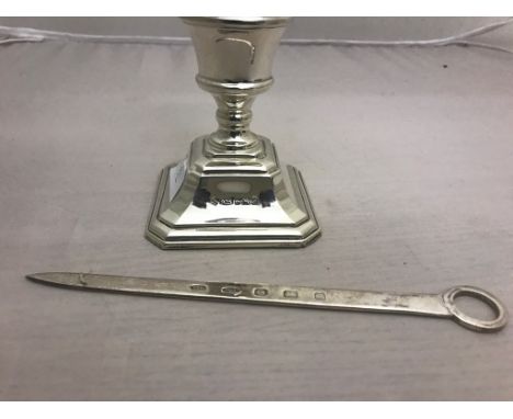 A HM silver squat candlestick and skewer
