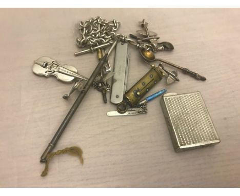 A silver Albert chain, Spitfire badges, vintage pens, violin etc