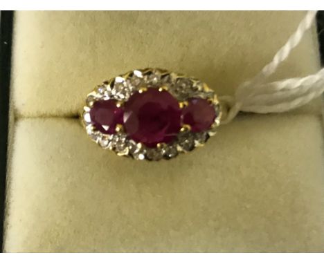An 18ct large ruby and diamond dress ring