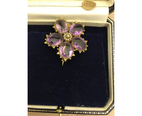 A Victorian amethyst and pearl brooch