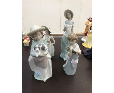 Four Nao figures to inc a lady holding puppies, a lady with butterfly etc