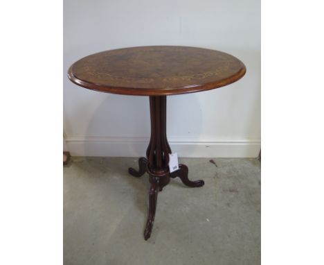 A Victorian inlaid walnut tilt top side table on a tripod base in restored condition - Height 72cm x 60cm x 41cm 